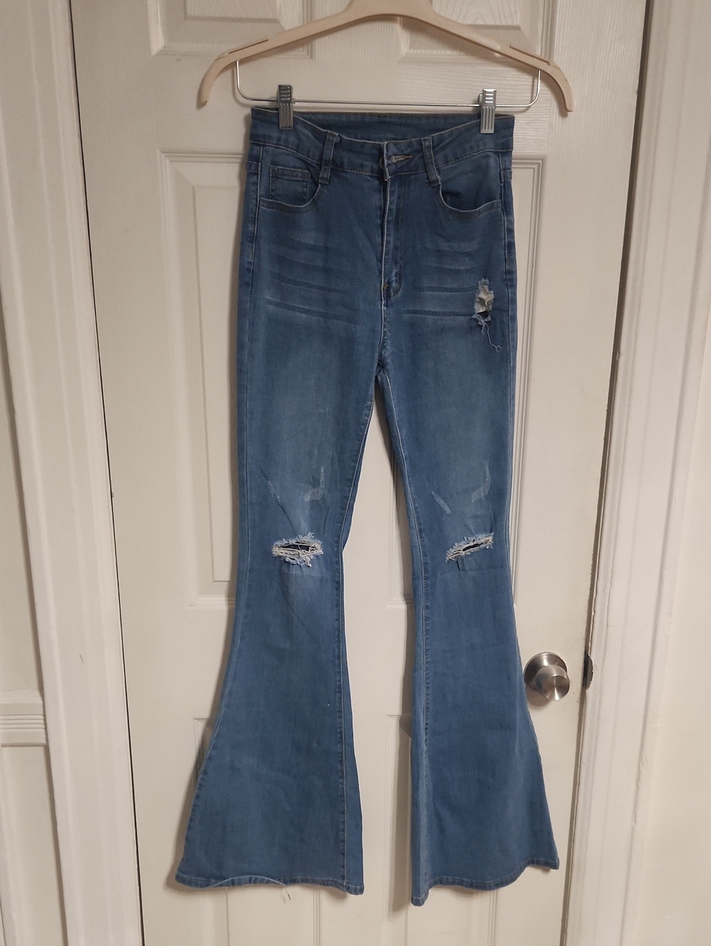 High-Rise Blue Distressed Flare Jeans - Women's